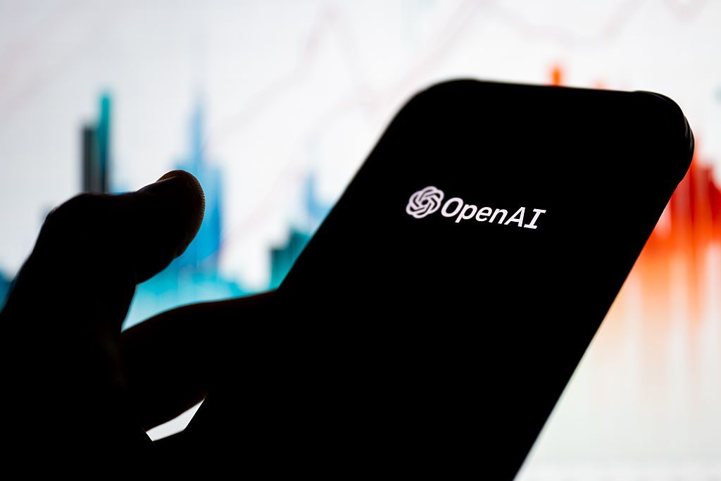 Image may contain Electronics Mobile Phone Phone Silhouette Adult Person and Mat